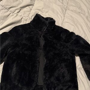 Fur jacket in small size in good condition.
